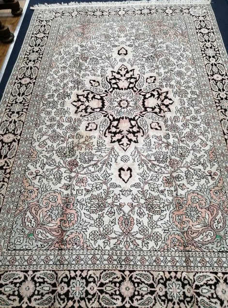 A silk carpet 270 x 177cm